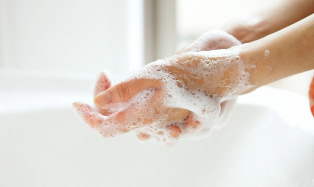Hands with lather on them