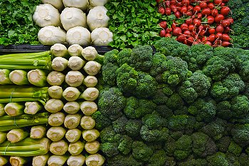 A pile of fresh veggies in the produce section of a store