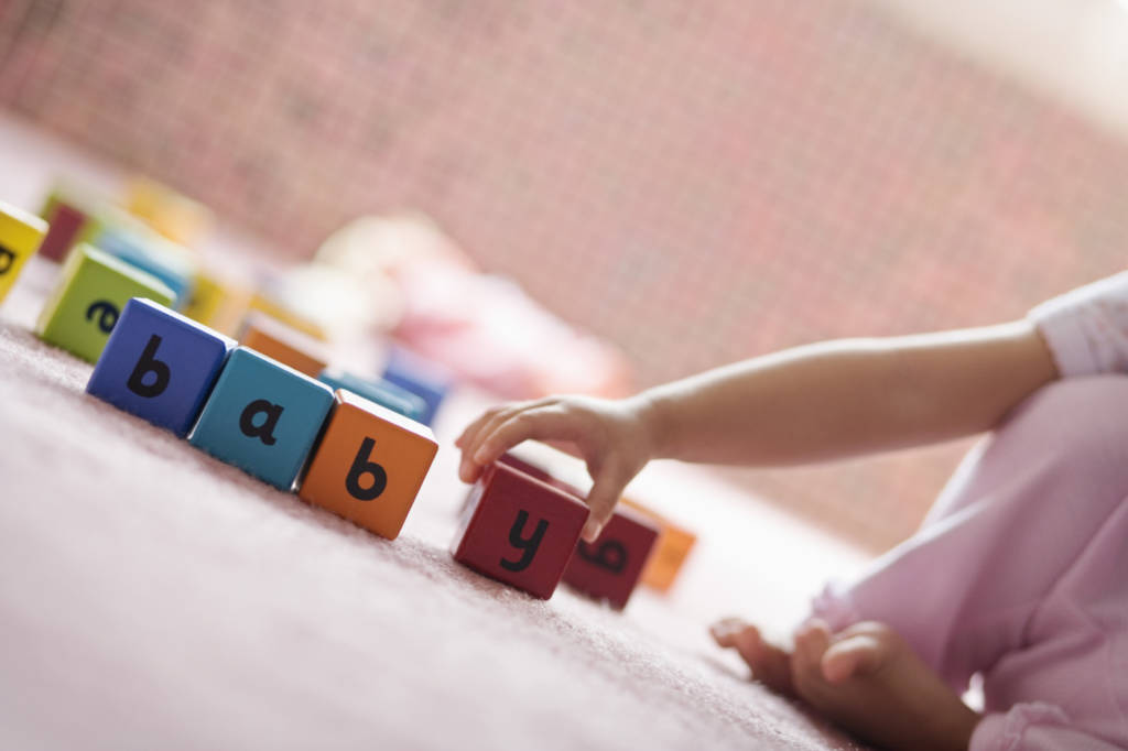 baby playing with blocks, wooden blocks