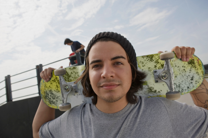 teen with skateboard