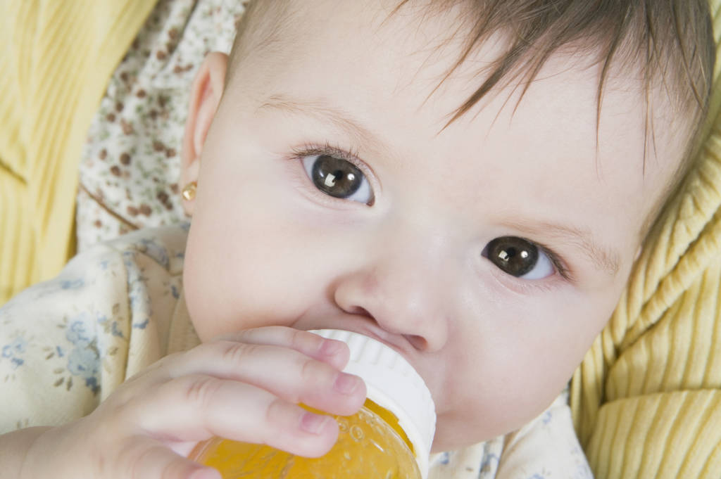 baby drinking juice