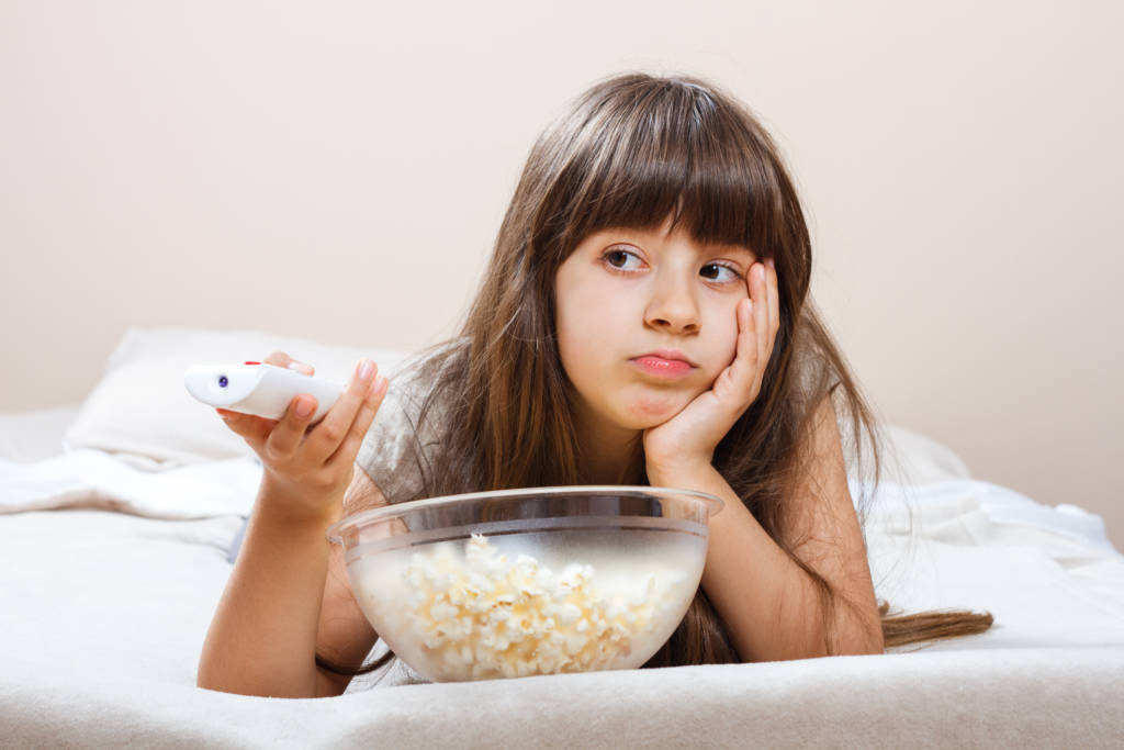 girl eating popcorn