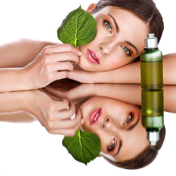 woman using organic skin care products